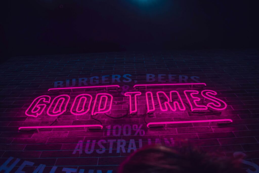 Pink neon sign: Good Times.